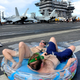 Illustration for article titled Steel Beach- When US Navy Ships Throw Giant Beach Picnic Parties